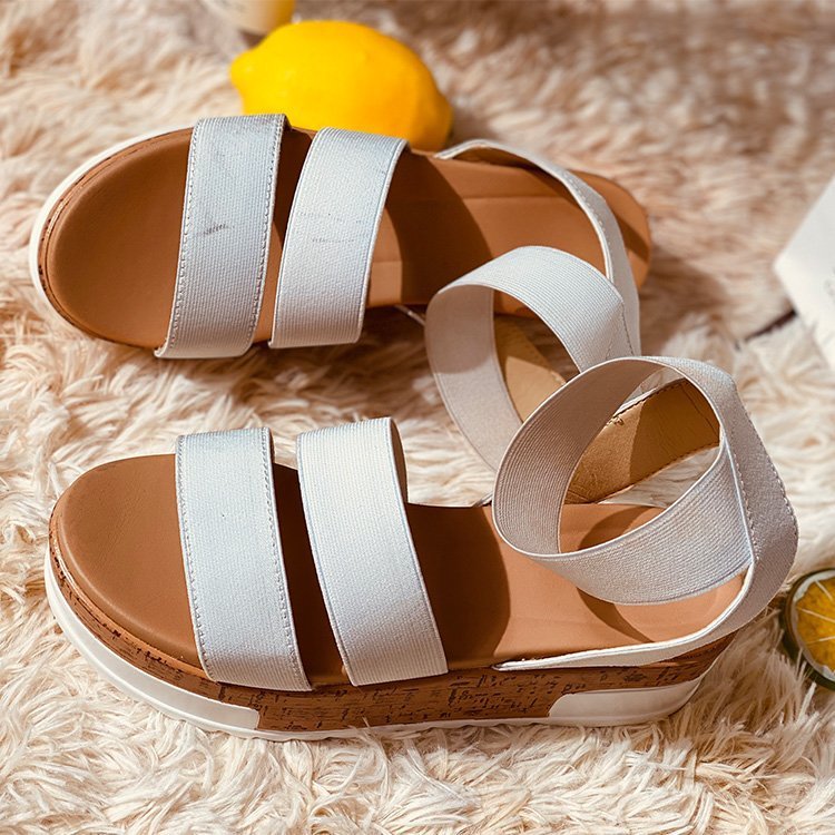 Beach sandals with thick soles and sloping heels